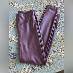 Faux leather burgundy leggings. They have a soft lining. Very comfortable!